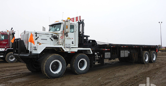 2011 Kenworth C500 bed truck sold at Ritchie Bros. 2011 Kenworth C500 bed truck sold at Ritchie Bros.